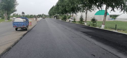工程纪实 公司国道鹤大公路宁安镇过境段工程沥青砼路面面层试验段正式开工