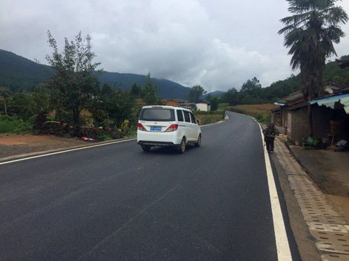 214国道丽江段改建工程基本完工 全线二级路面 设计时速60公里